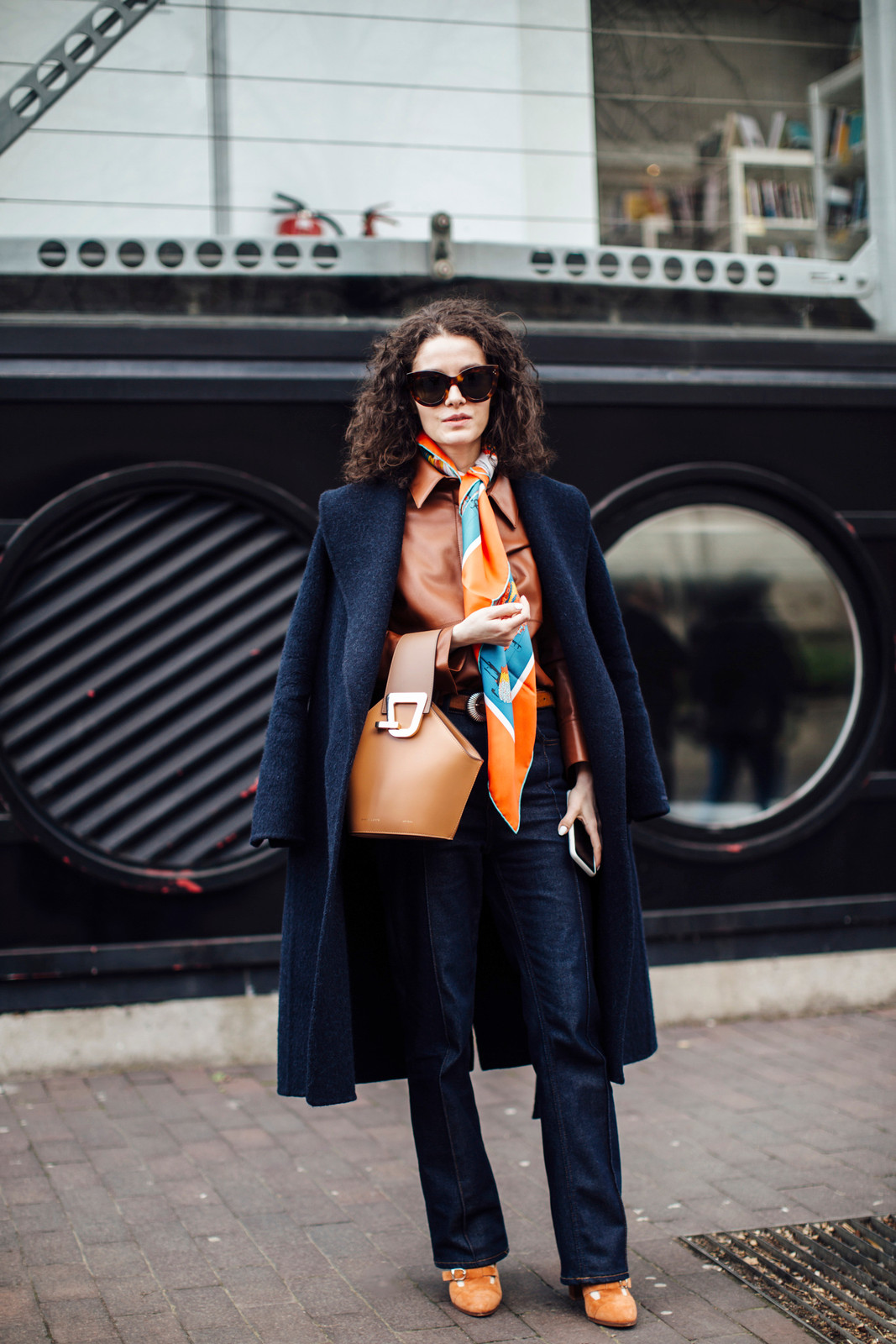 Denim Flare Pants with Leather Jacket, Wool Coat, and Orange Shoes Denim Flare Pants with Leather Jacket, Wool Coat, and Orange Shoes — Skinny Flare Pants Outfits 2027