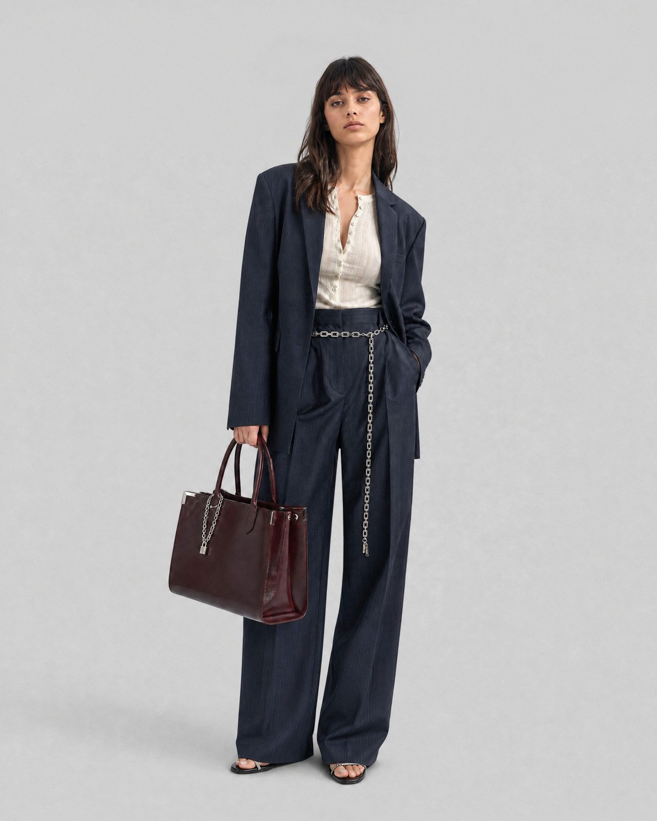 Business Casual Polish: Navy Pinstripe Wide-Leg Trousers with Blazer and Chain Belt Business Casual Polish: Navy Pinstripe Wide-Leg Trousers with Blazer and Chain Belt — Navy Blue Wide Leg Pants Outfits 2027