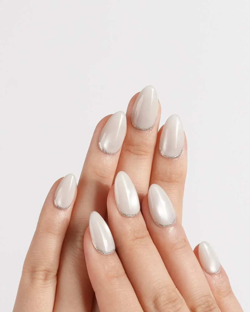 Milky White Pearlescent with Silver Cuticle Line — Medium Almond Nails 2027