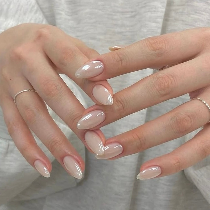 Sheer Nude Pearlescent Almond Nails Sheer Nude Pearlescent Almond Nails — Modest Nails 2027