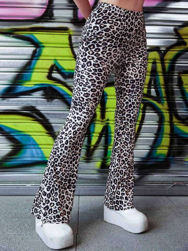 Dramatic Flare: Faux Leather Leggings with Crop Top and Platforms Dramatic Flare: Faux Leather Leggings with Crop Top and Platforms — Flare Leggings Outfits 2027