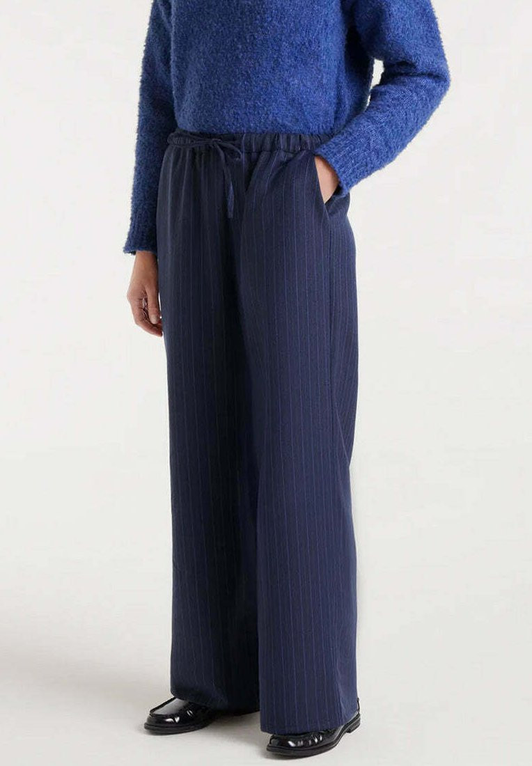 Pinstripe Texture: Navy Wide-Leg Pants with Blue Sweater Pinstripe Texture: Navy Wide-Leg Pants with Blue Sweater — Navy Blue Wide Leg Pants Outfits 2027