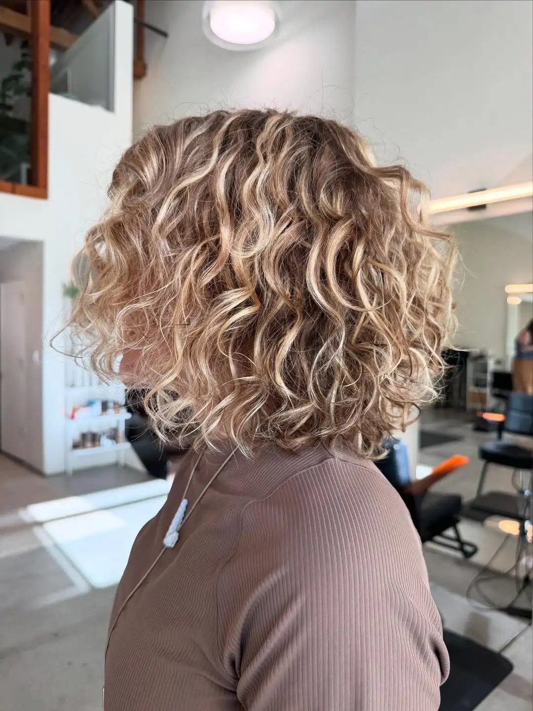 Ear Length Honey Blonde Shag With Wispy Bangs Ear Length Honey Blonde Shag With Wispy Bangs — Haircuts 2027 for Wavy Hair