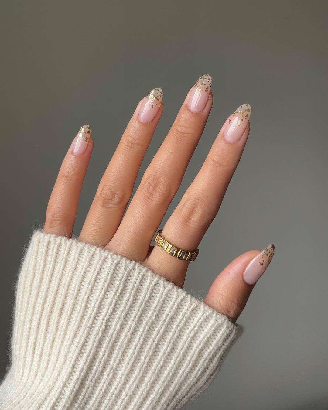 Sheer Nude with Scattered Gold Flakes Sheer Nude with Scattered Gold Flakes — Gold Christmas Nails 2026