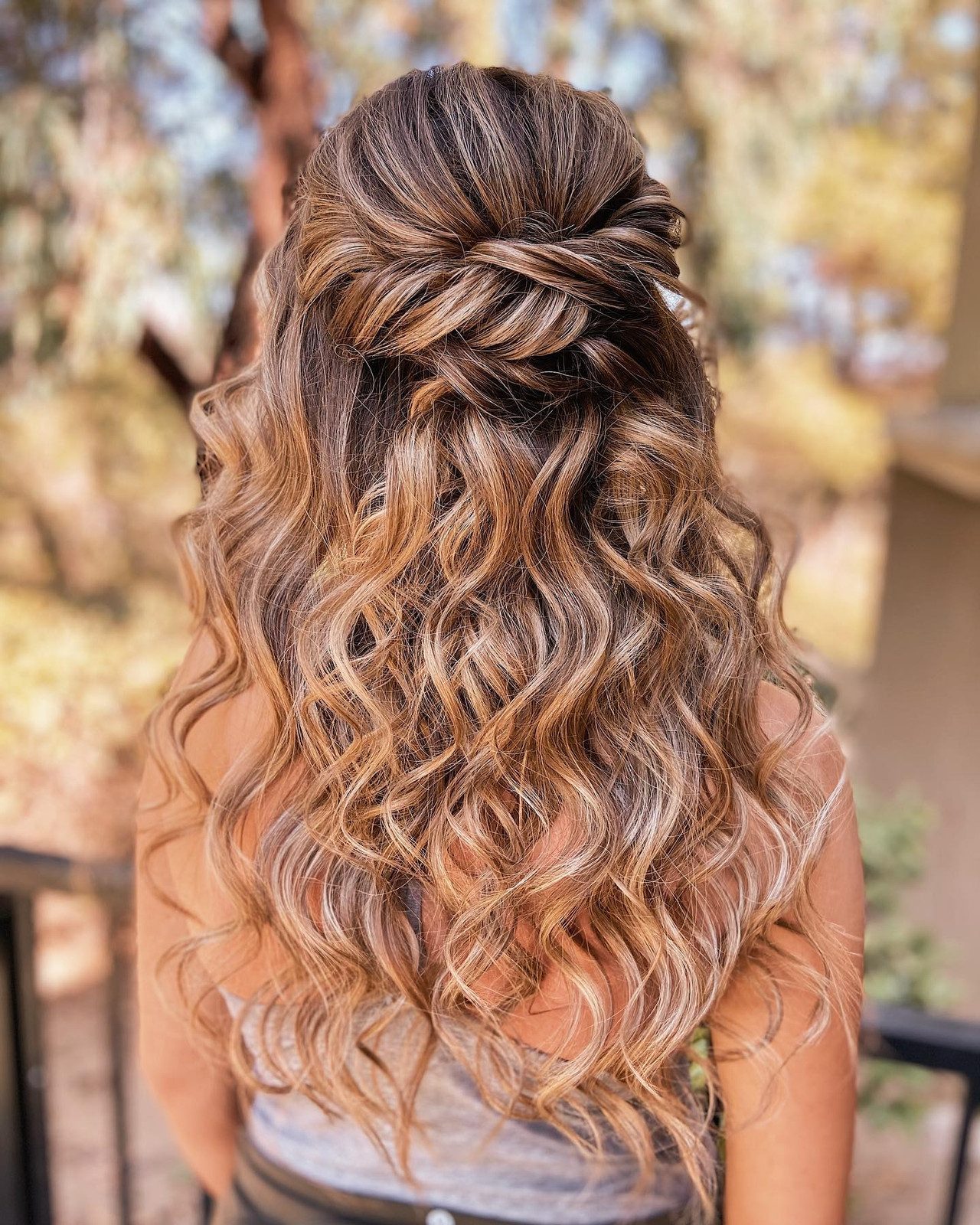 Half-Up Twisted Knot With Curls — Prom Hairstyles 2027 for Curly Hair