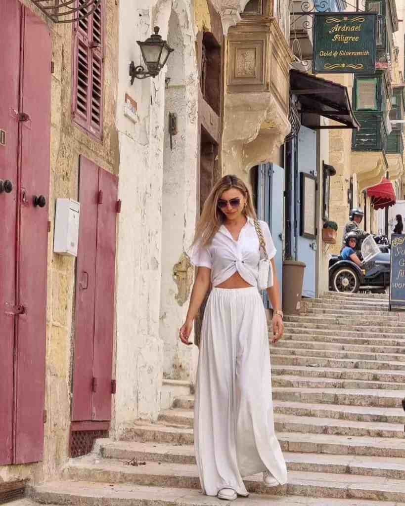 White Knotted Crop Top and Wide-Leg Pants for Travel White Knotted Crop Top and Wide-Leg Pants for Travel — Italy Summer Outfits 2027