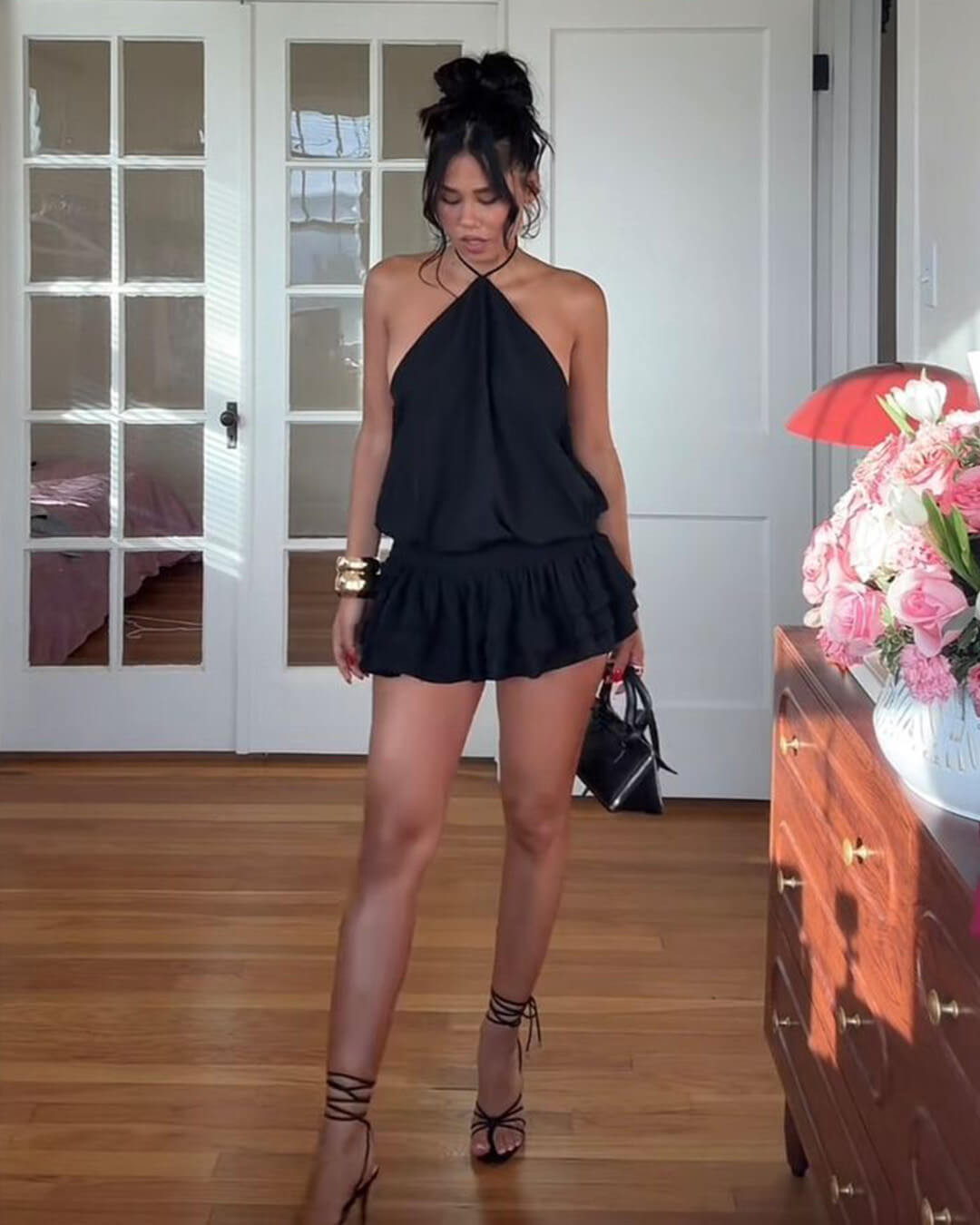 Black Halter Mini Dress with Ruffled Hem and Strappy Heels Black Halter Mini Dress with Ruffled Hem and Strappy Heels — Backless Dresses 2027