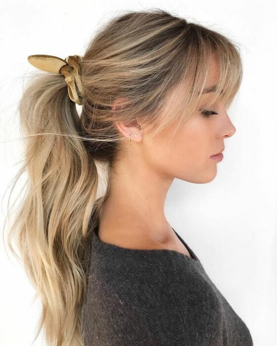 Ash Blonde High Ponytail With Wispy Fringe Ash Blonde High Ponytail With Wispy Fringe — Prom Hairstyles 2027 with Bangs