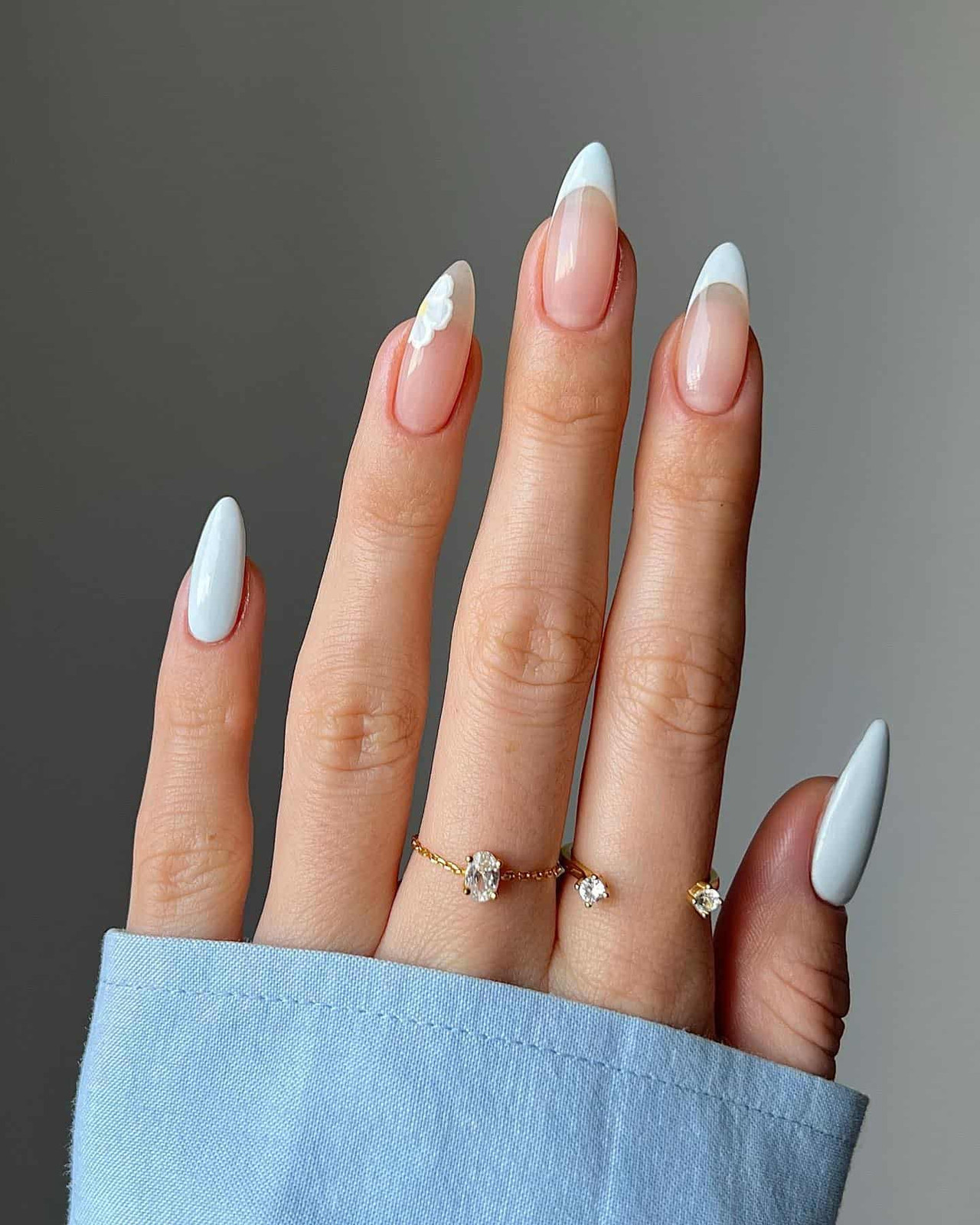 Sheer Nude French with Blue Floral Accent — Medium Almond Nails 2027