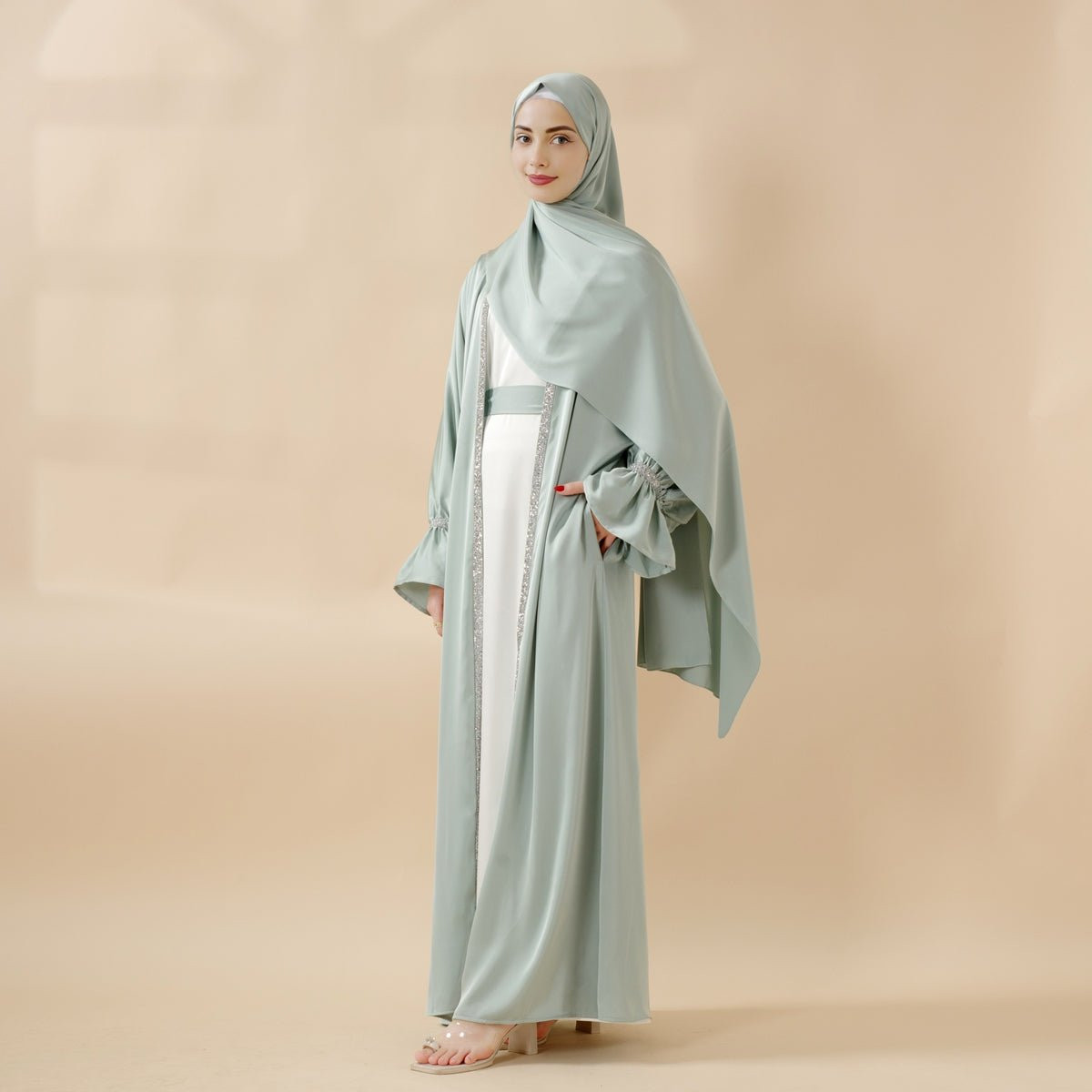 Pale Green Satin Abaya with Embellished Inner Dress Pale Green Satin Abaya with Embellished Inner Dress — Hijab Outfits 2027
