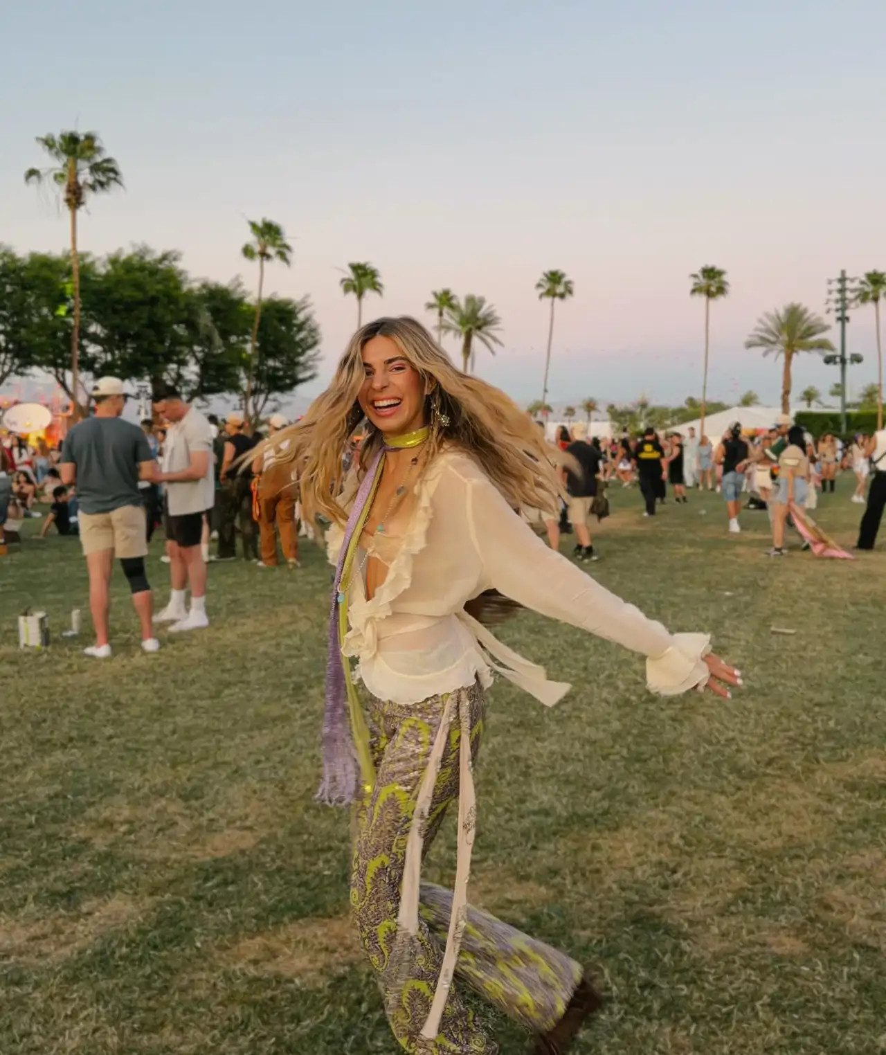 Sheer Ruffled Blouse with Patterned Trousers — Summer Country Concert Outfits 2027