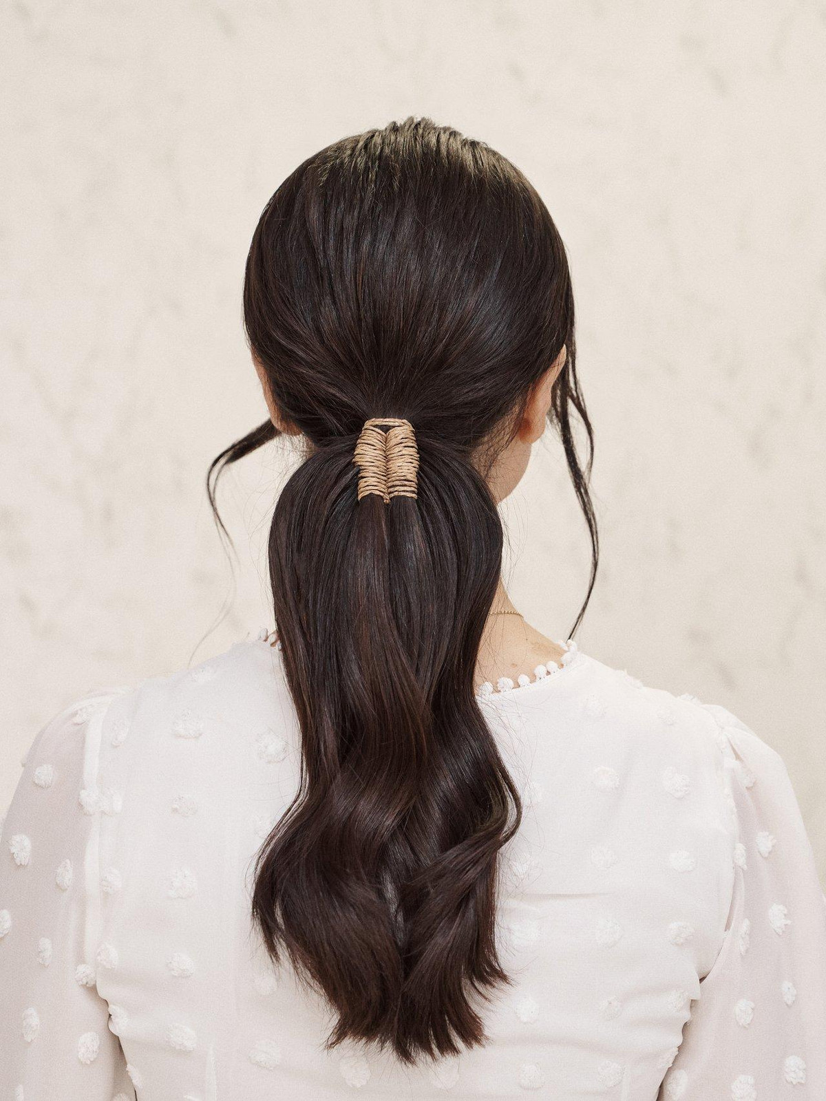 Low Ponytail With Textured Wrap Low Ponytail With Textured Wrap — Easy Ponytail Hairstyles 2027