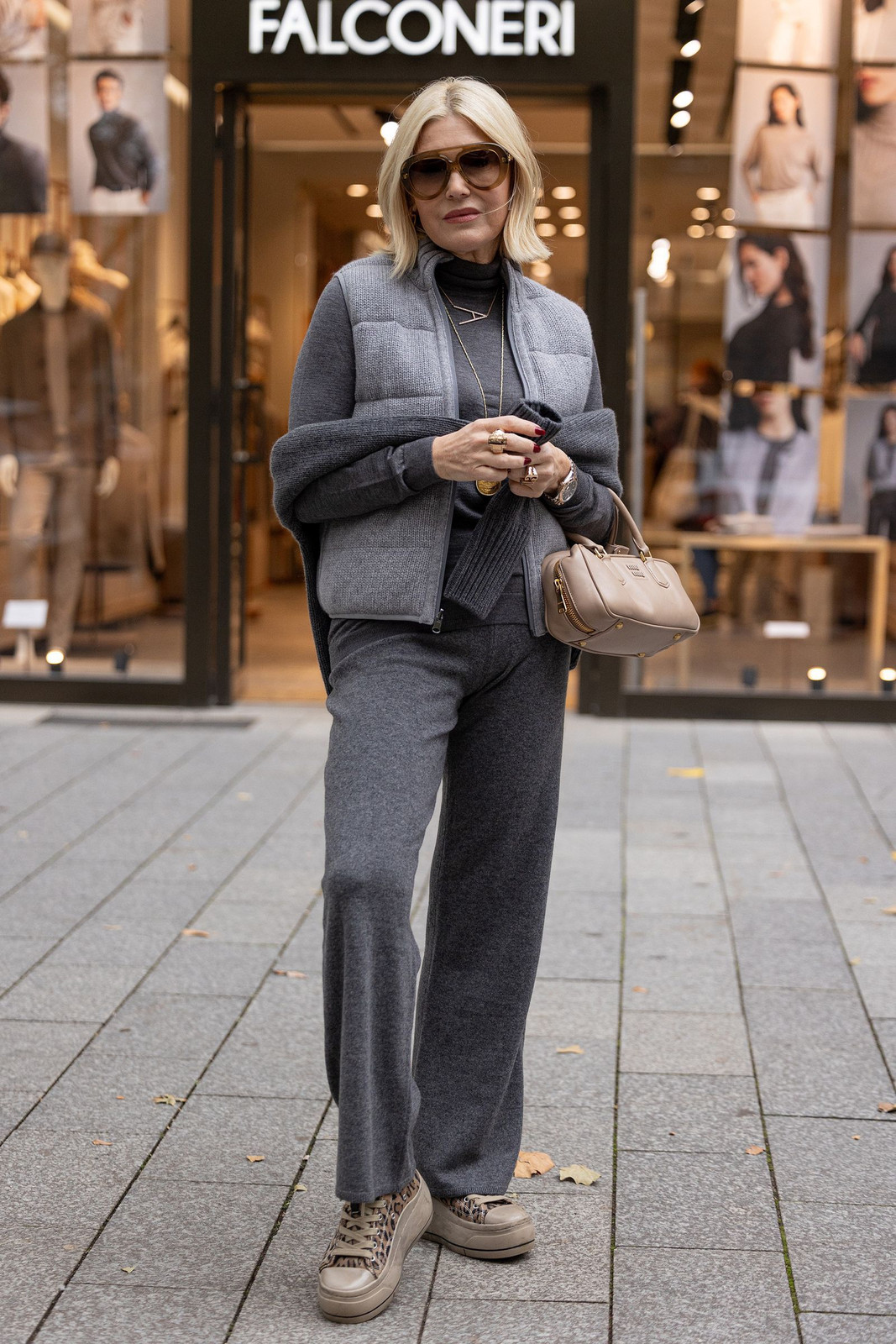 Sophisticated Grey: Puffer Vest with Turtleneck, Sweater, and Wide Trousers Sophisticated Grey: Puffer Vest with Turtleneck, Sweater, and Wide Trousers — Puffer Vest Outfits 2027