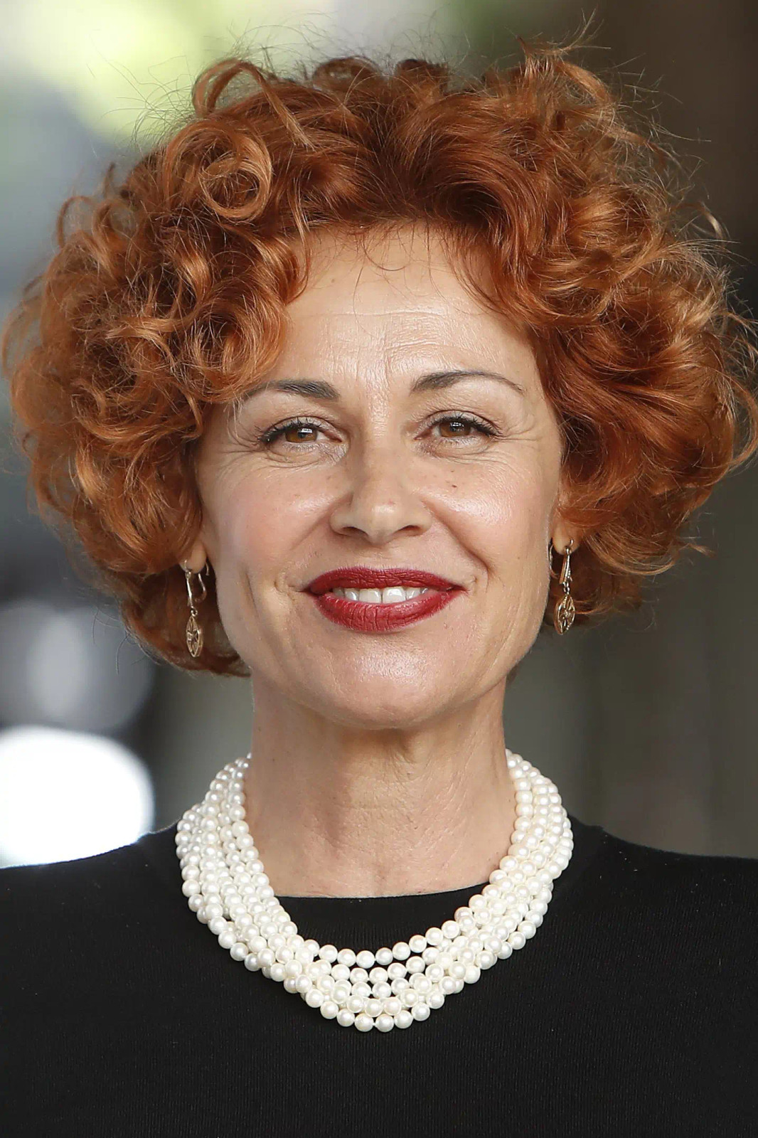 Red Visual Idea Red Visual Idea — Curly Bob 2027