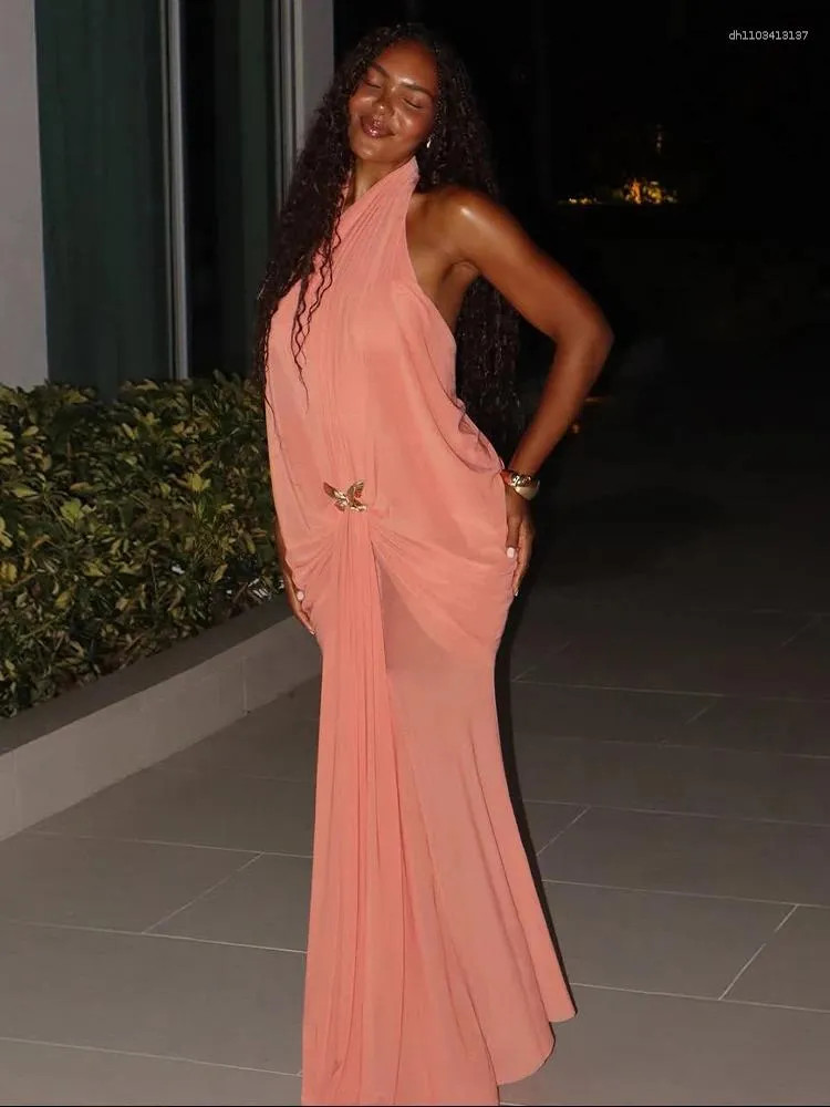 Peach Perfection: Draped Halter Maxi with Butterfly Detail — Holiday Party Outfits 2026