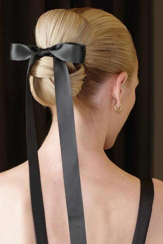 Sleek Blonde Bun with Trailing Ribbon — Ribbon Hairstyles 2027