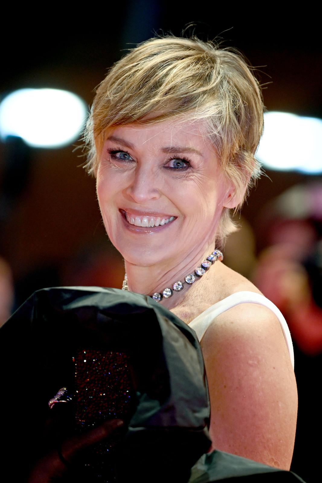 Blonde Pixie With Grey Roots and Texture Blonde Pixie With Grey Roots and Texture — Hairstyles 2027 for Women Over 60