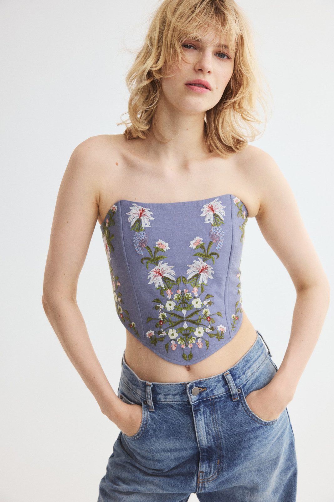 Delicate Embroidery: Dusty Blue Floral Corset with Denim Delicate Embroidery: Dusty Blue Floral Corset with Denim — Floral Corset Top Outfits 2027