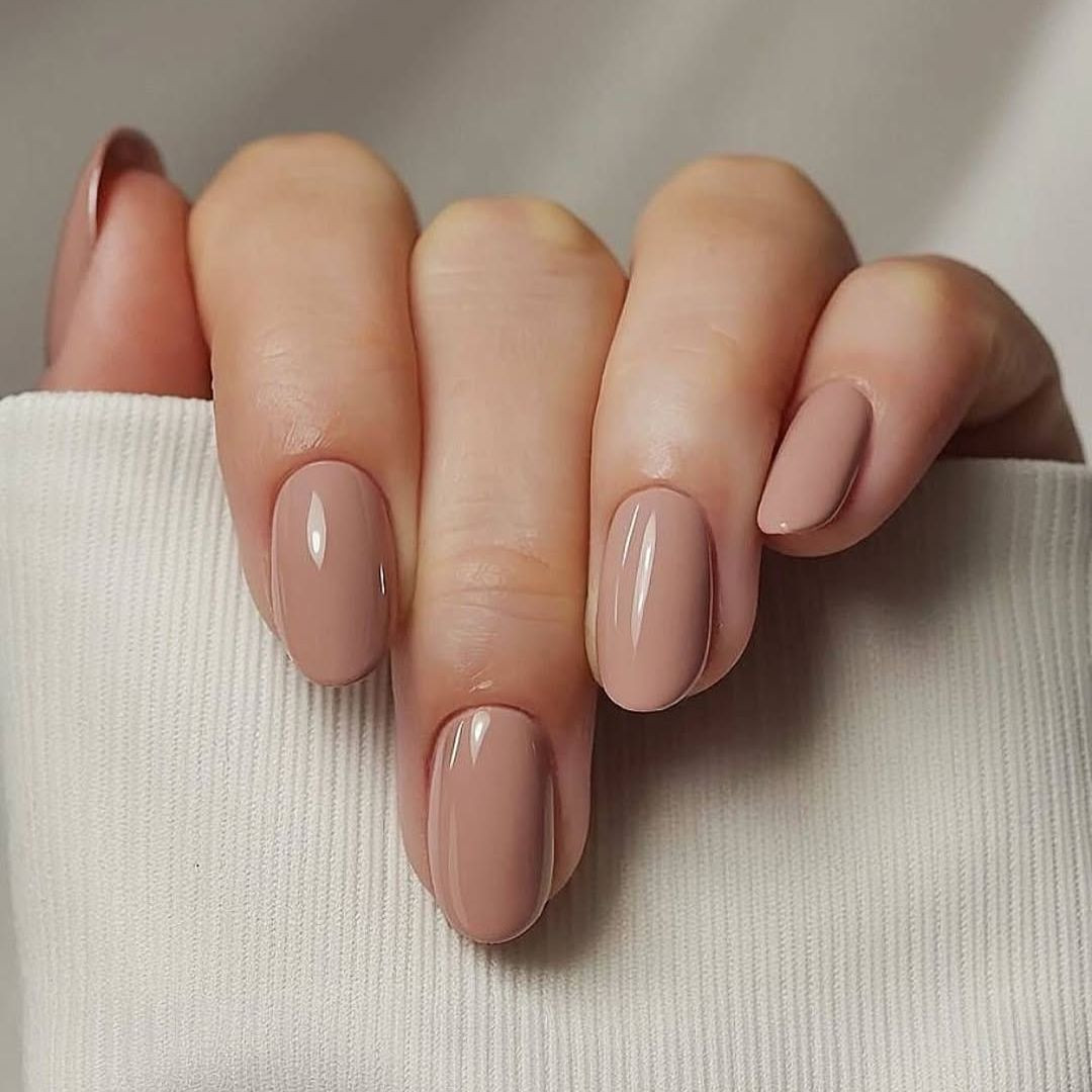 Muted Beige-Pink Glossy Short Almond Muted Beige-Pink Glossy Short Almond — Nails 2027 for Fair Skin