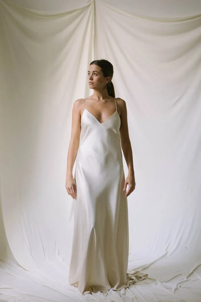 Timeless Ivory Slip Dress with Flowing Silhouette and Flat Sandals Timeless Ivory Slip Dress with Flowing Silhouette and Flat Sandals — Slip Dresses 2027