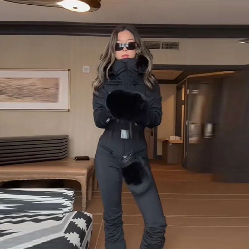 Skiing Sleek Black Ski Suit with Faux Fur Trim and Belt Skiing Sleek Black Ski Suit with Faux Fur Trim and Belt — Ski Outfits for Women 2027