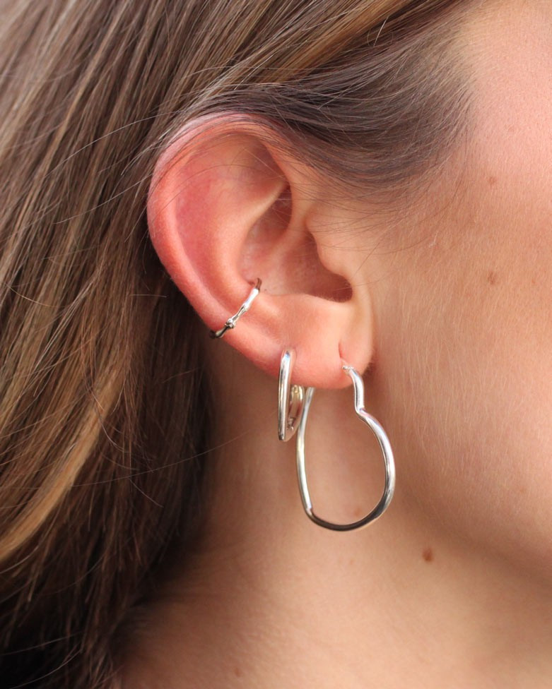 Heart-Shaped Silver Hoop: A Romantic Detail Heart-Shaped Silver Hoop: A Romantic Detail — Silver Hoops Outfits 2027