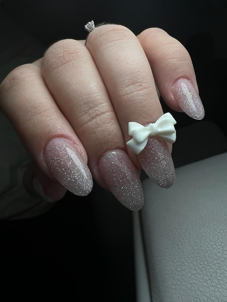 Glitter Overlay with a Matte White 3D Bow Glitter Overlay with a Matte White 3D Bow — Christmas Bow Nails 2026