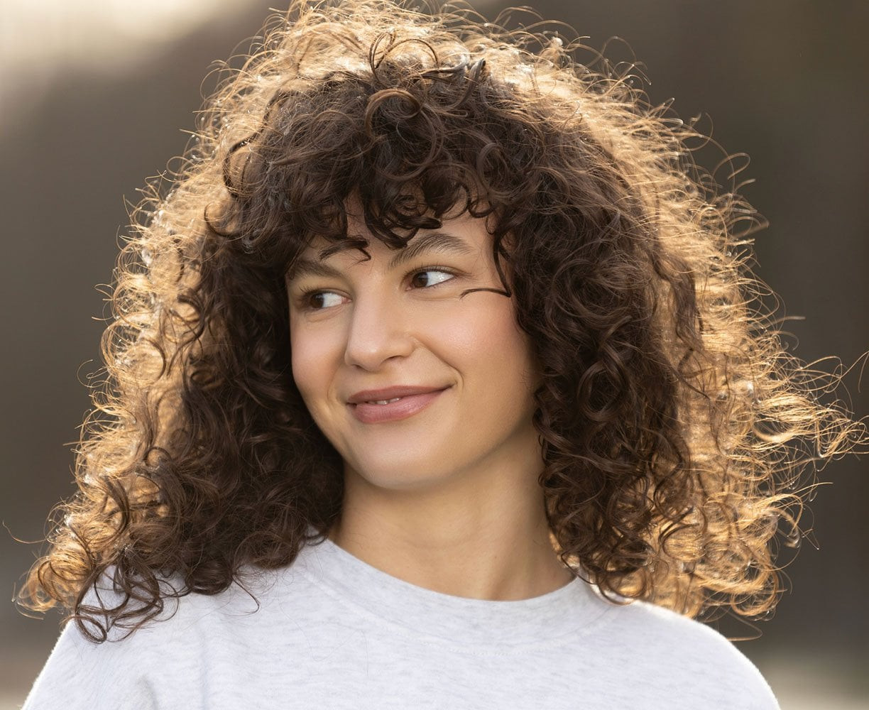 Dark Blonde Lob with Voluminous Curls — Hairstyles 2027 for Thin Hair