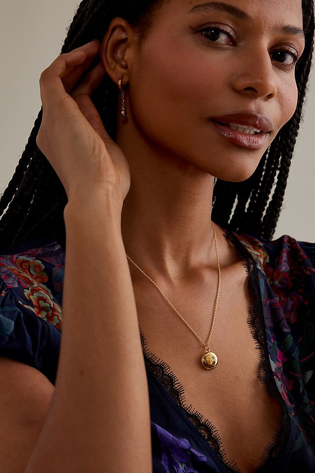 Dark Floral Lace Dress Paired with a Gold Locket Necklace Dark Floral Lace Dress Paired with a Gold Locket Necklace — Locket Necklaces 2027
