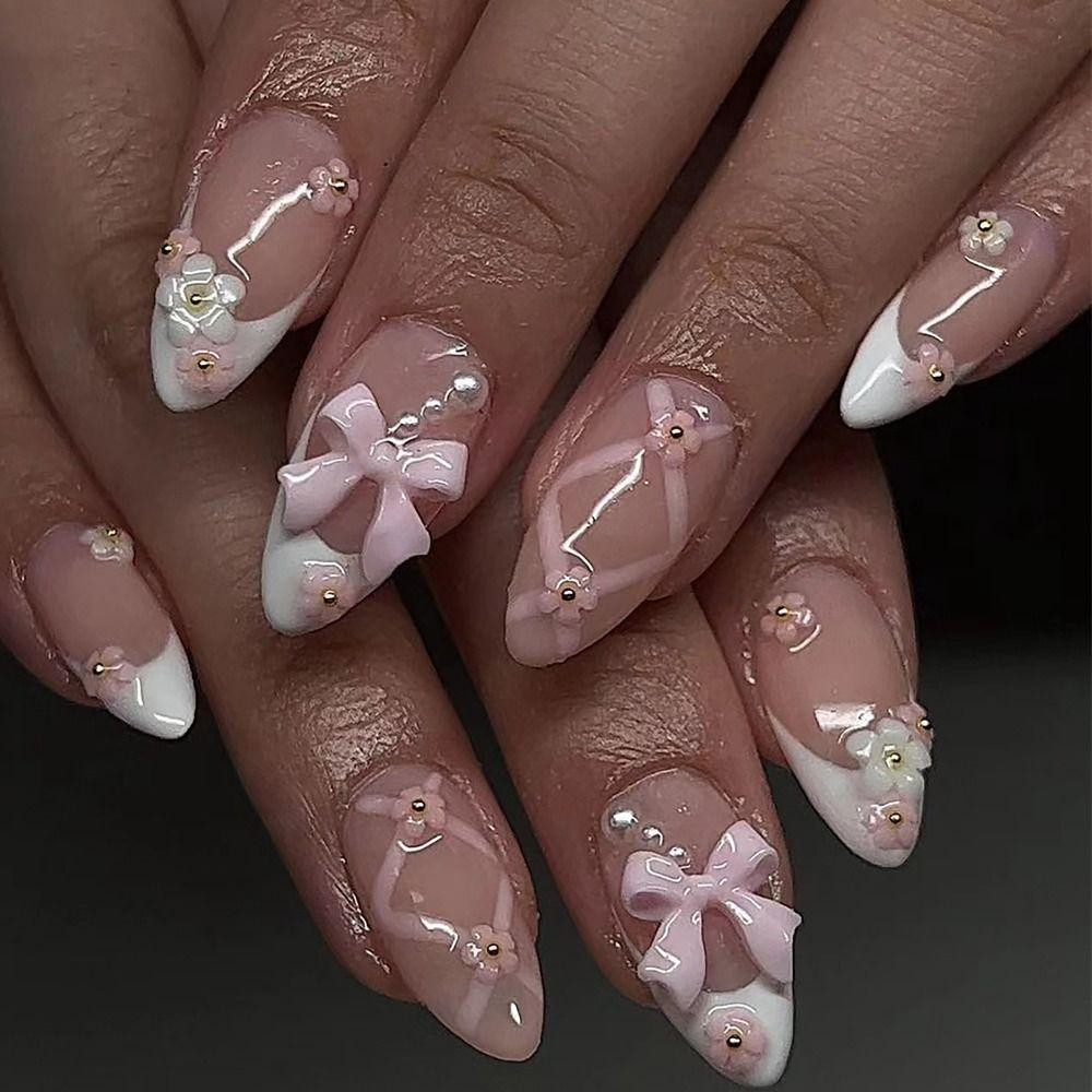 Nude French Stilettos with Bows and Pearls Nude French Stilettos with Bows and Pearls — Bow Stiletto Nails 2027