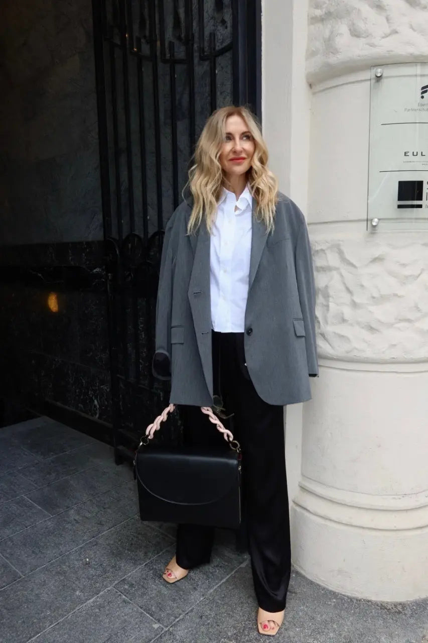 Oversized Grey Blazer with White Shirt and Black Trousers: A Relaxed Professional Mix Oversized Grey Blazer with White Shirt and Black Trousers: A Relaxed Professional Mix — Business Professional Outfits 2027