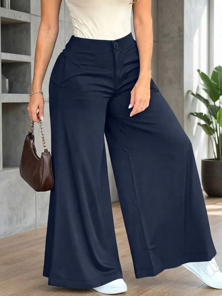 Navy Palazzo Pants with White Tank and Sneakers Navy Palazzo Pants with White Tank and Sneakers — Spring Trouser Outfits 2027