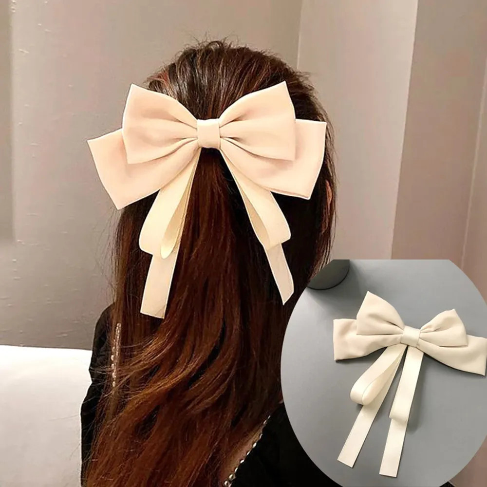Wavy Ponytail with Large Satin Bow — Ribbon Hairstyles 2027