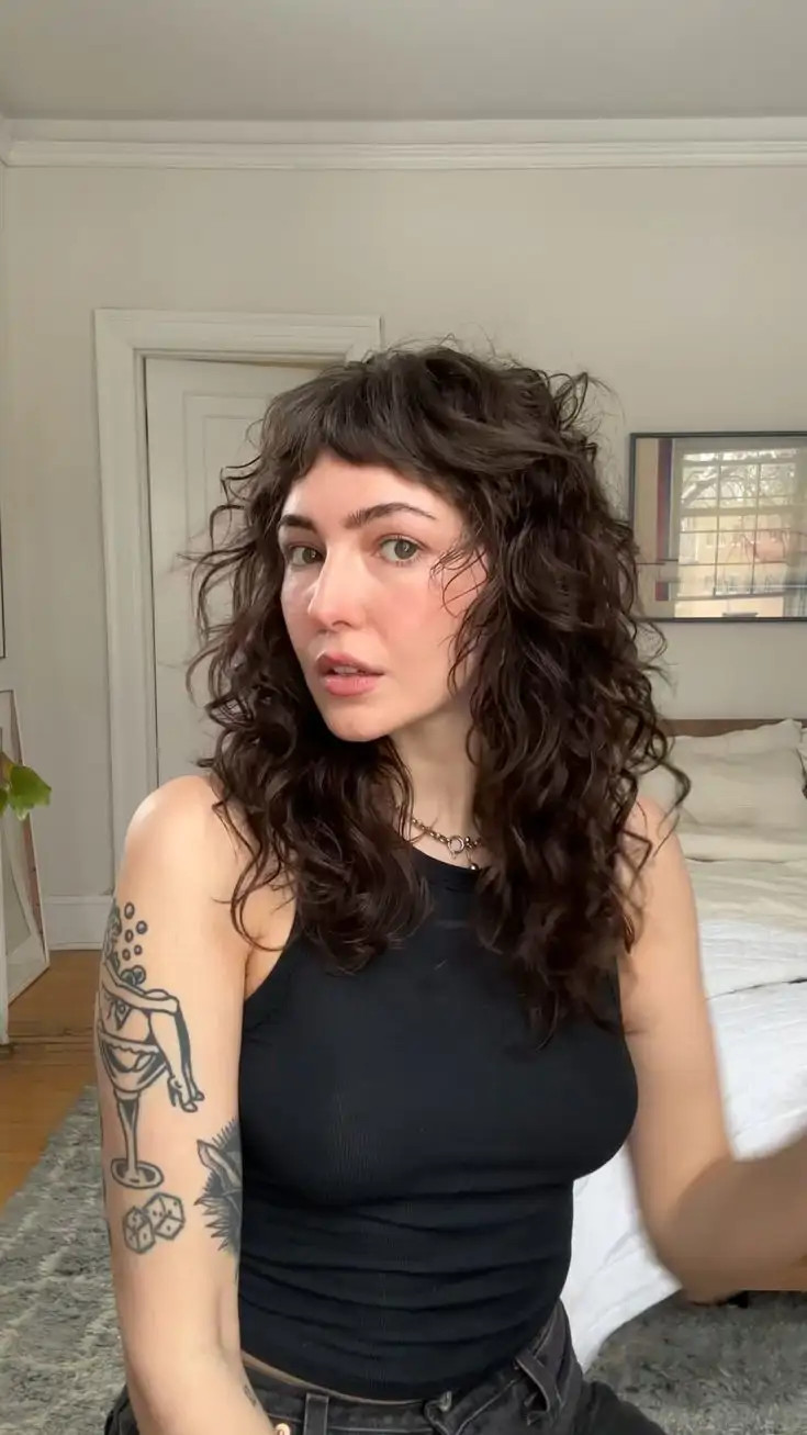 Collarbone Shag With Choppy Bangs Collarbone Shag With Choppy Bangs — Haircuts 2027 for Wavy Hair