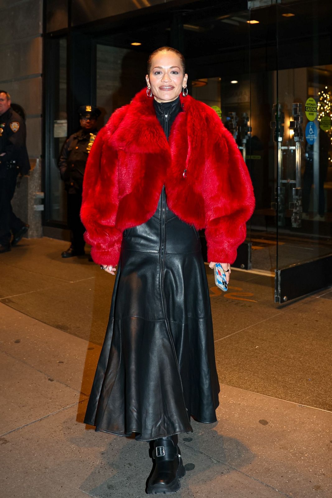 Dramatic Red Faux Fur Jacket Over a Black Ensemble Dramatic Red Faux Fur Jacket Over a Black Ensemble — Red Outfits 2027