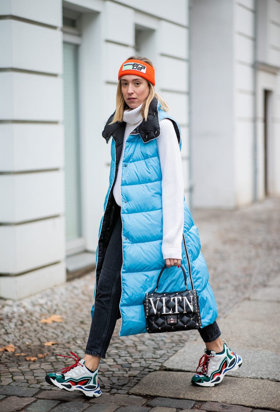 Bold Blue: Long Vest with Turtleneck and Studded Bag Bold Blue: Long Vest with Turtleneck and Studded Bag — Puffer Vest Outfits 2027