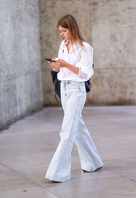 Extremely Wide Flare Denim with White Button-Down Shirt and Platforms Extremely Wide Flare Denim with White Button-Down Shirt and Platforms — Skinny Flare Pants Outfits 2027