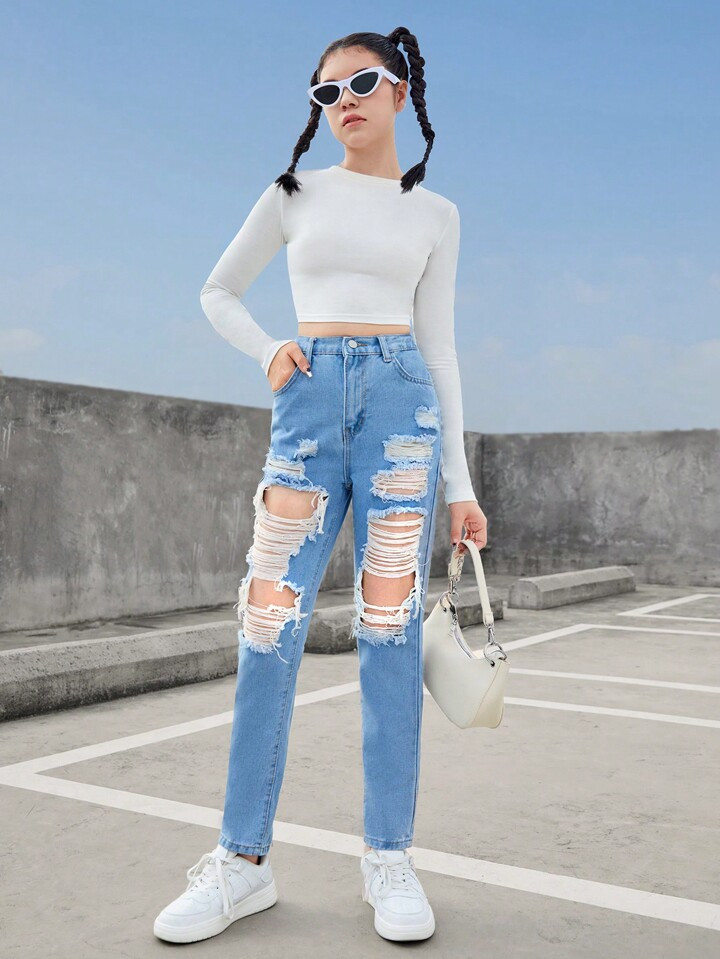 All White Ensemble: Cropped Top and Ripped Jeans for a Fresh Look All White Ensemble: Cropped Top and Ripped Jeans for a Fresh Look — Teen Outfits 2027