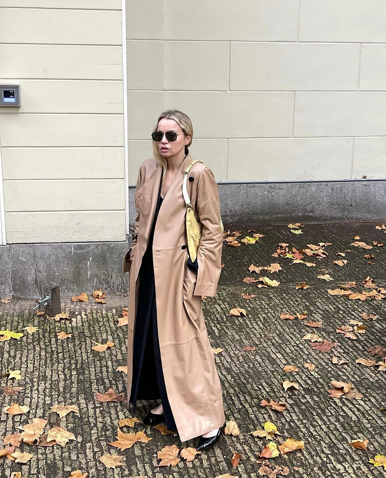 Classic Trench: Beige Coat over Black Dress — Spring Capsule Wardrobe 2027