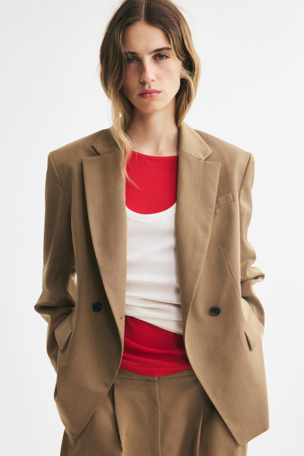 Beige Double-Breasted Blazer with Layered Tops Beige Double-Breasted Blazer with Layered Tops — Business Formal Outfits 2027