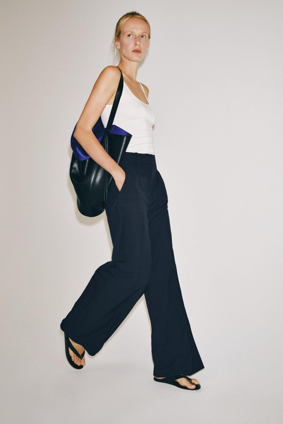 Casual Layering: Navy Wide-Leg Trousers with Cropped Jacket and Tank Casual Layering: Navy Wide-Leg Trousers with Cropped Jacket and Tank — Navy Blue Wide Leg Pants Outfits 2027