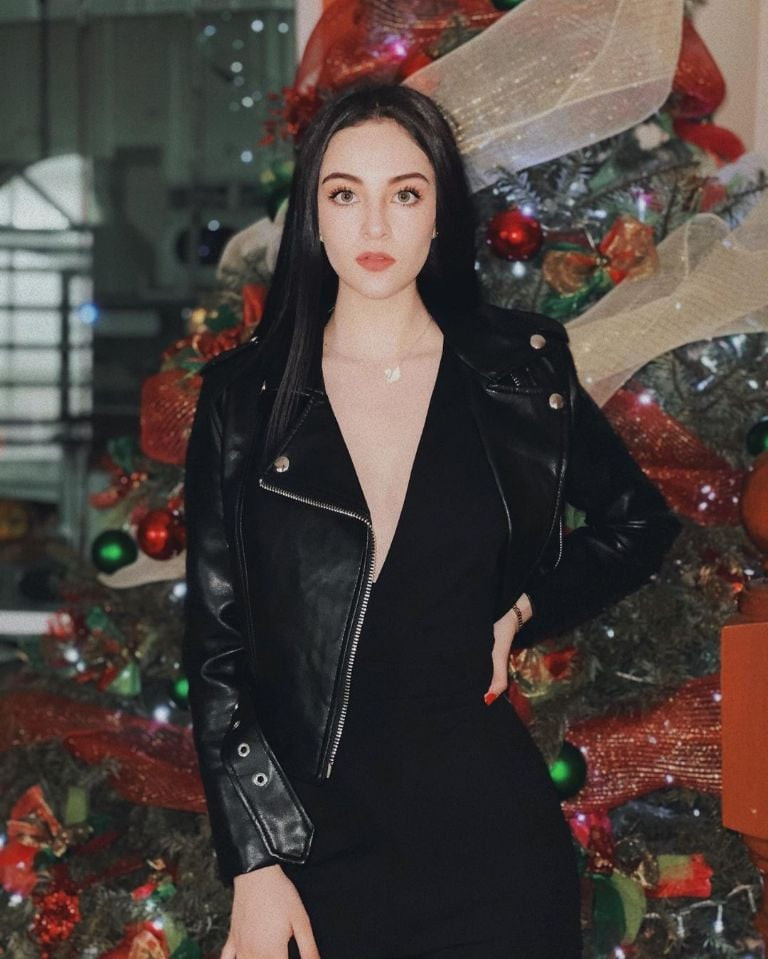 Timeless Rocker: Biker Jacket and Deep V-Neck Dress Timeless Rocker: Biker Jacket and Deep V-Neck Dress — Rockstar Girlfriend Outfits 2027