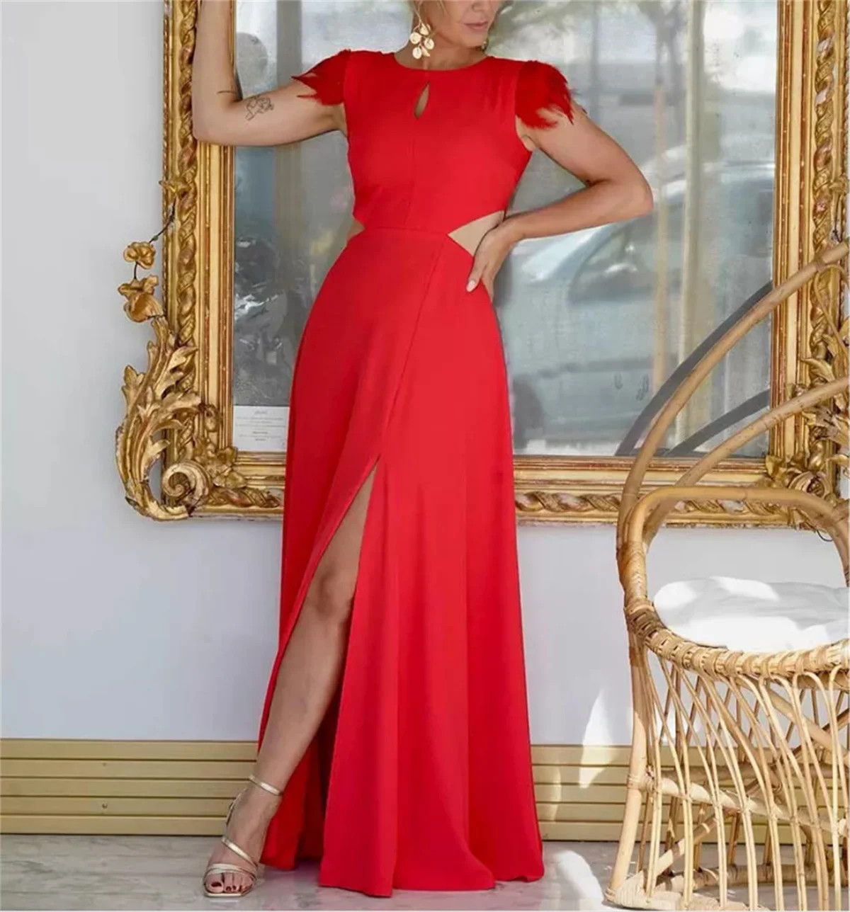 Vibrant Red Maxi Dress with Feather Details and Waist Cut-outs Vibrant Red Maxi Dress with Feather Details and Waist Cut-outs — Red Prom Dresses 2027