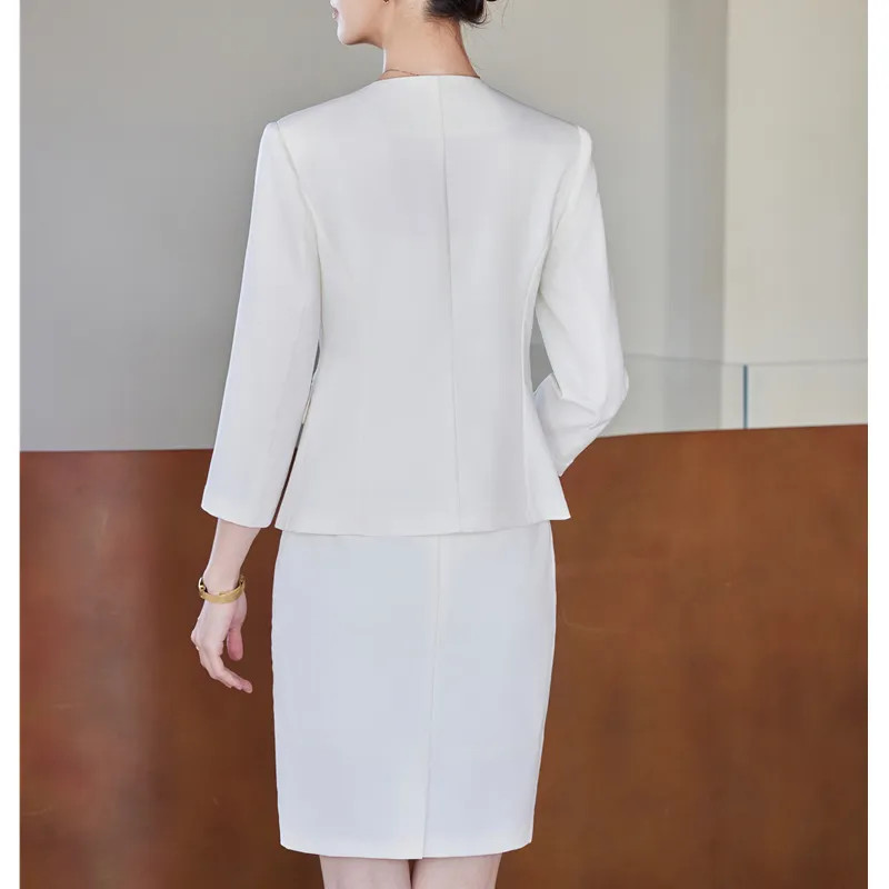 Ivory Textured Blazer with Pencil Skirt and Gold Bracelet Ivory Textured Blazer with Pencil Skirt and Gold Bracelet — Conference Outfits 2027