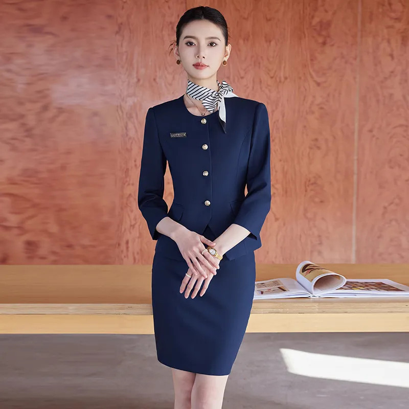 Fitted Navy Suit with Skirt and Striped Scarf Accent Fitted Navy Suit with Skirt and Striped Scarf Accent — Conference Outfits 2027