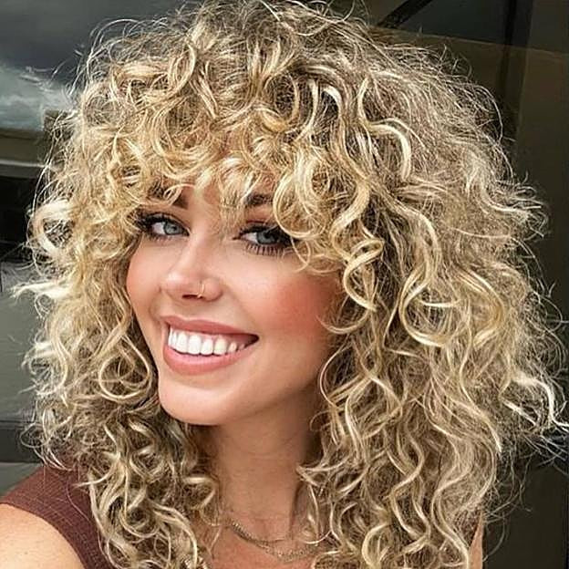 Platinum Shag With Root Shadow Platinum Shag With Root Shadow — Haircuts 2027 for Wavy Hair