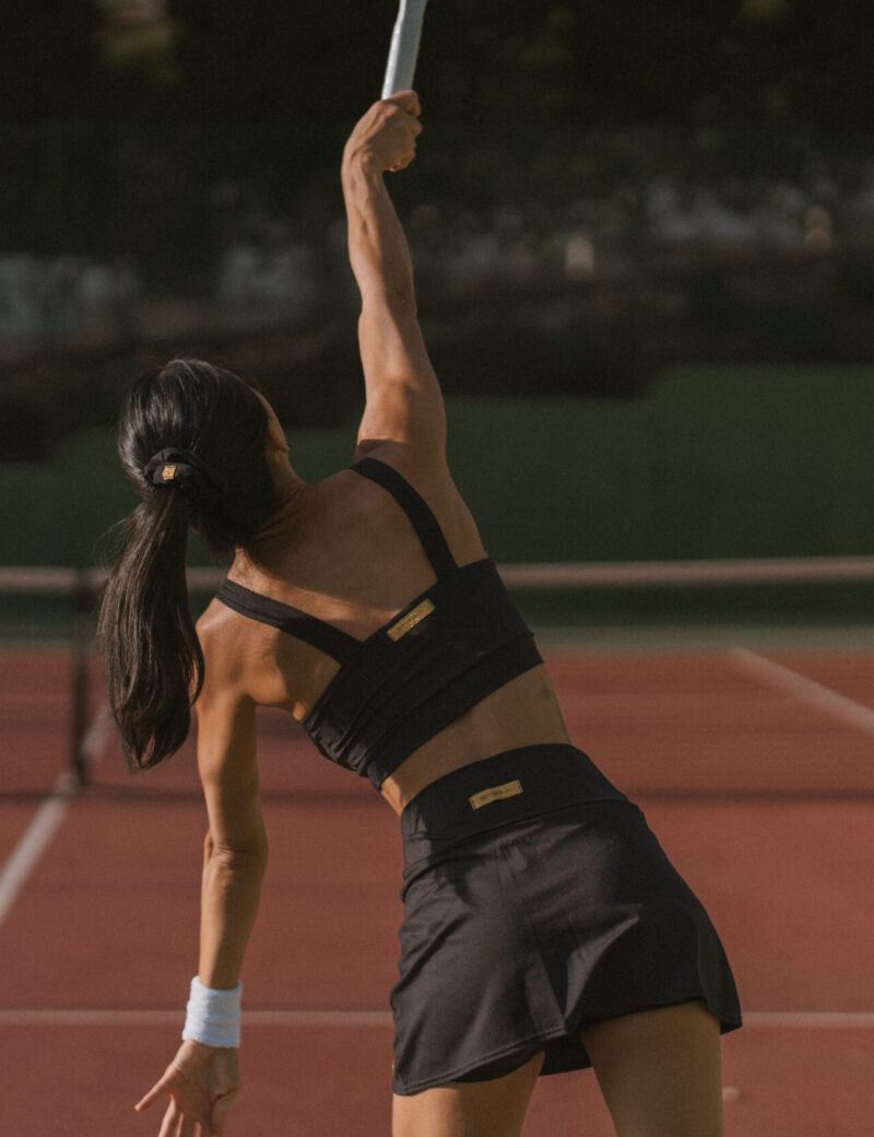 White Sneakers Action-Ready Black Tennis Skirt and Sports Bra White Sneakers Action-Ready Black Tennis Skirt and Sports Bra — Tennis Skirt Outfits 2027