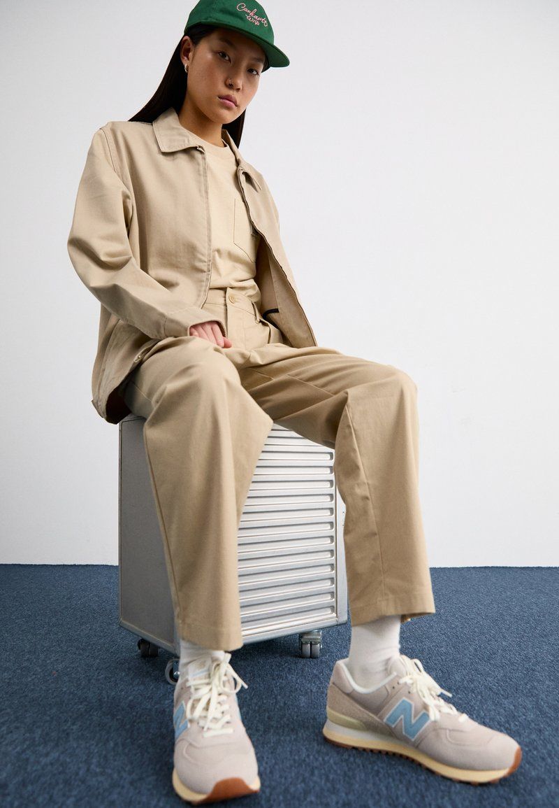 Monochromatic Beige with a Pop of Green Monochromatic Beige with a Pop of Green — New Balance Outfits 2027