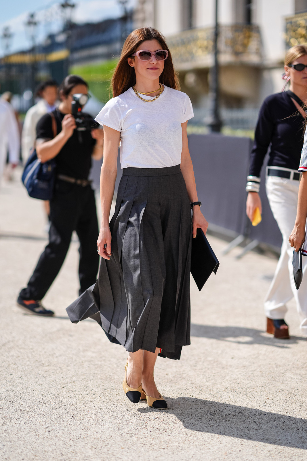 Sophisticated Casual: White Tee with Pleated Midi Skirt Sophisticated Casual: White Tee with Pleated Midi Skirt — Summer Outfits 2027 for Women Over 50