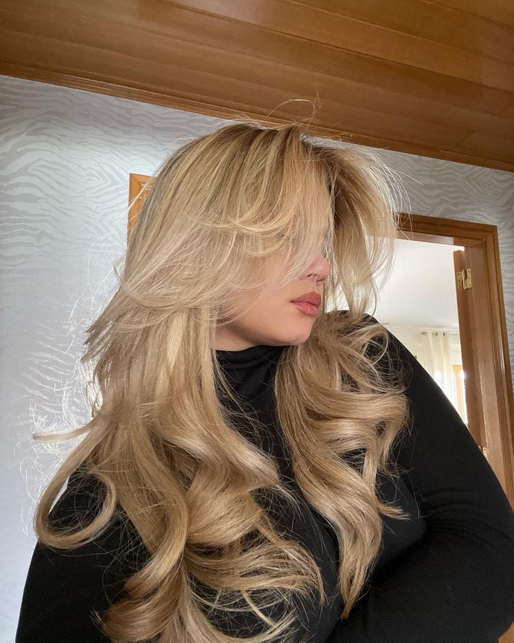 Voluminous Ash Blonde Blowout With Bangs Voluminous Ash Blonde Blowout With Bangs — Hairstyles 2027 for Hot Weather